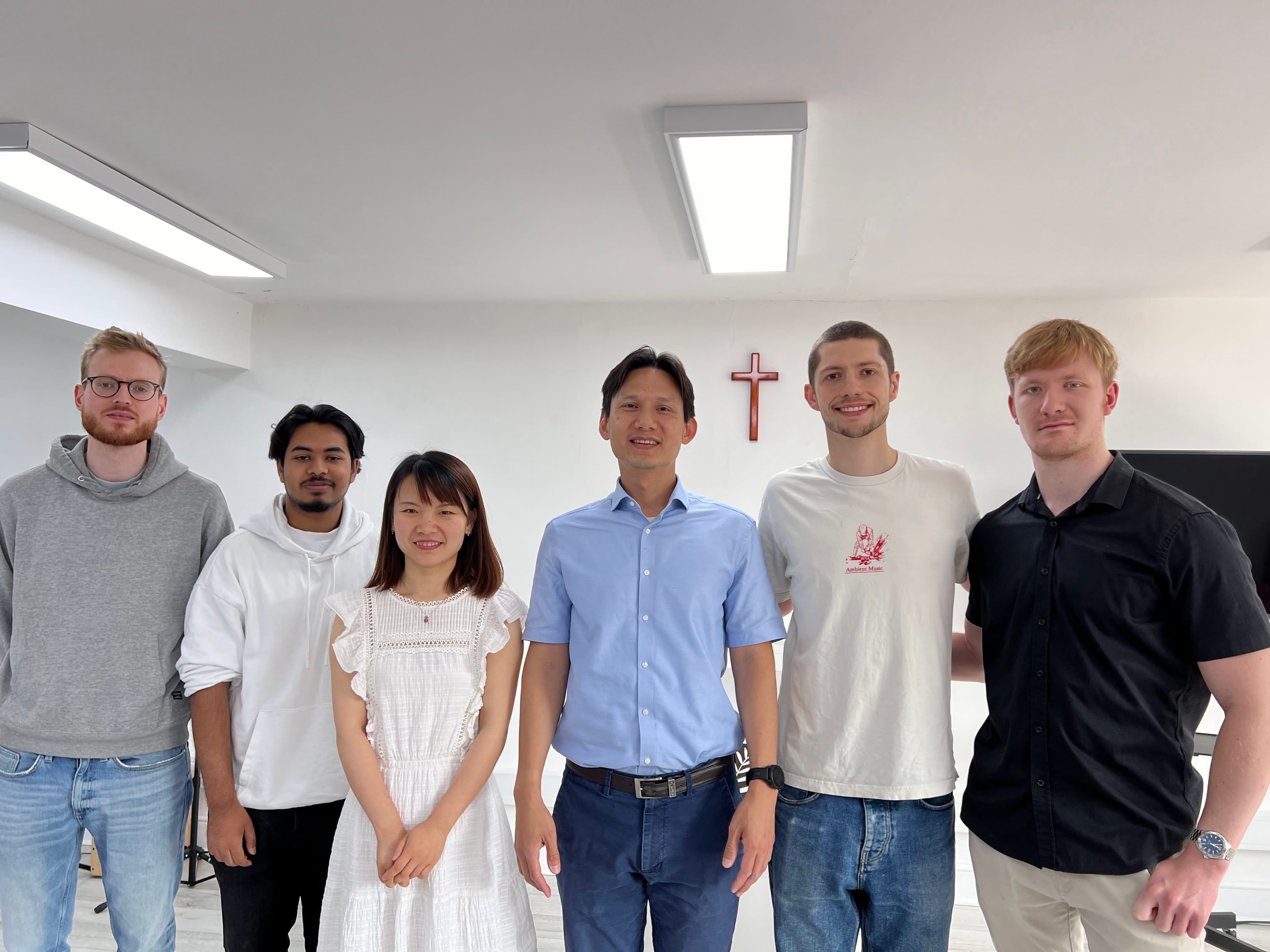 A small group of Young Disciples members gathered together in a bright room